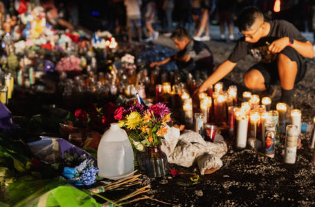 SAN ANTONIO, TX – JUNE 30: Mourners laid bottles of water on the ground at a makeshift memorial which has been erected at the site where 53 migrants died on June 30, 2022 in San Antonio, Texas. Four people have been arrested and charged after 53 migrants died inside a semi-truck in San Antonio in what is being called the deadliest human smuggling incident in US history.   Jordan Vonderhaar/Getty Images/AFP (Photo by Jordan Vonderhaar / GETTY IMAGES NORTH AMERICA / Getty Images via AFP)