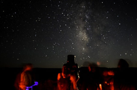 Star PartyVisitors view night sky objects through a telescope. Celebrating the designation of Canyonlands as an International Dark Sky Park, September 18, 2015 Credit: NPS/Chris Wonderly. Original public domain image from Flickr