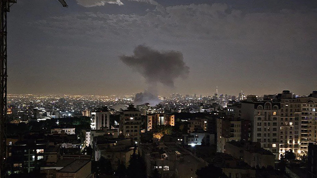 This handout photo released by Iran's Revolutionary Guard Corps (IRGC) official Sepah News Telegram channel on June 13, 2025 shows smoke billowing from a site reportedly targeted by an Israeli strike in the Iranian capital Tehran early in the morning. (SEPAH NEWS / AFP)